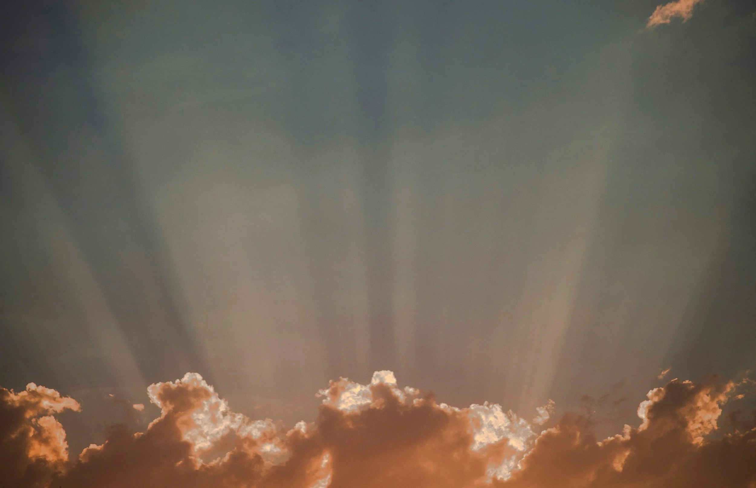 Sunbeams breaking through clouds