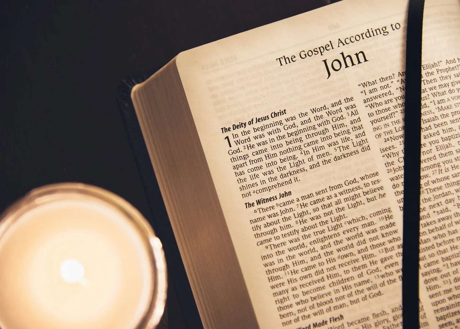 Open Bible and candle